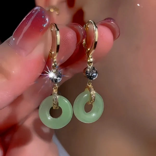 Magnifiques boucles d'oreilles clip paix plaquées or (Sénégal)
