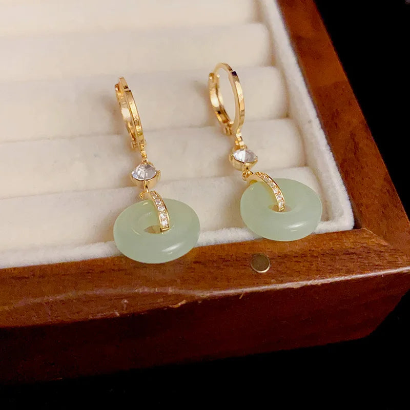 Magnifiques boucles d'oreilles clip paix plaquées or (Sénégal)