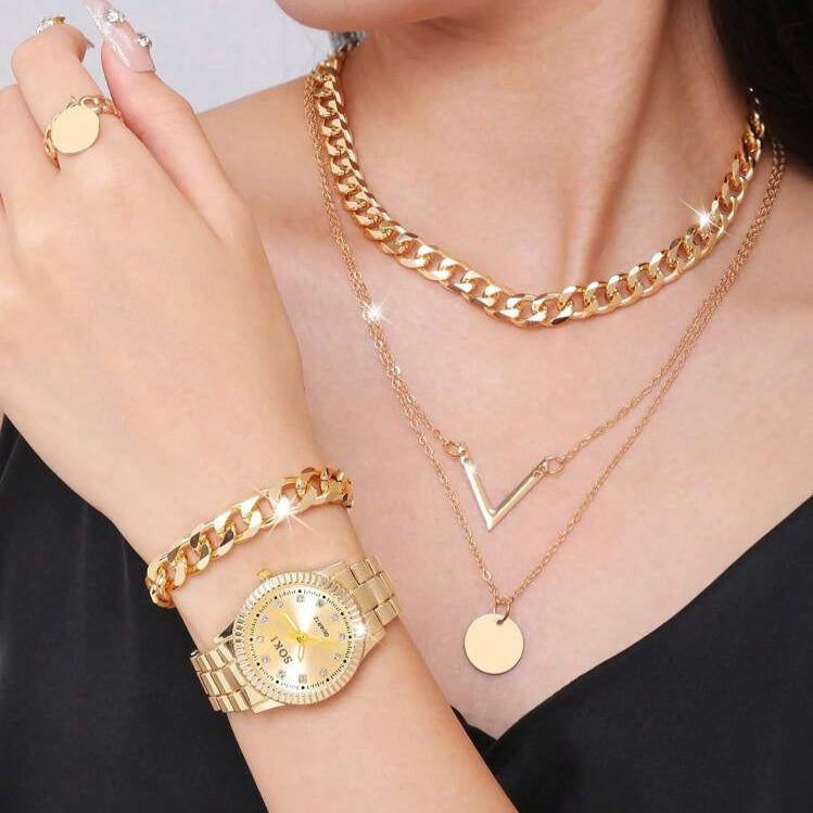 Ensemble montre et bijoux plaqués or (Congo)