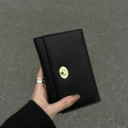 Portefeuille noir raffiné pour femme (Benin)