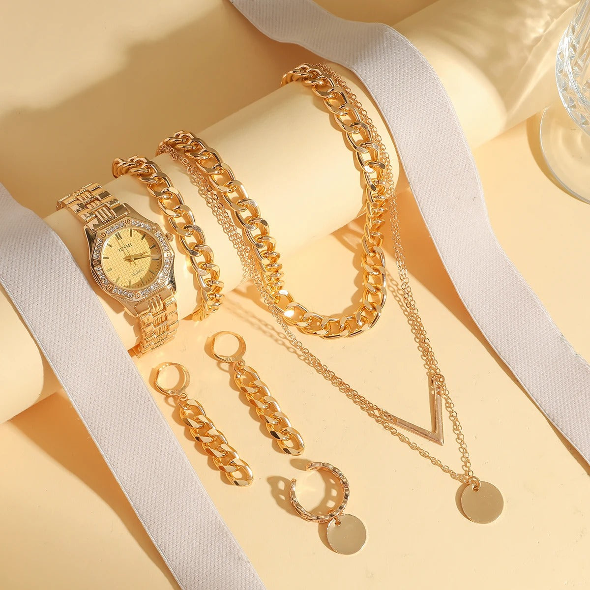 Ensemble montre et bijoux plaqués or (Congo)